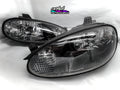 NB1 Mazda MX-5 Miata MK2 gloss black insert restored original headlights by carhub retrowerks