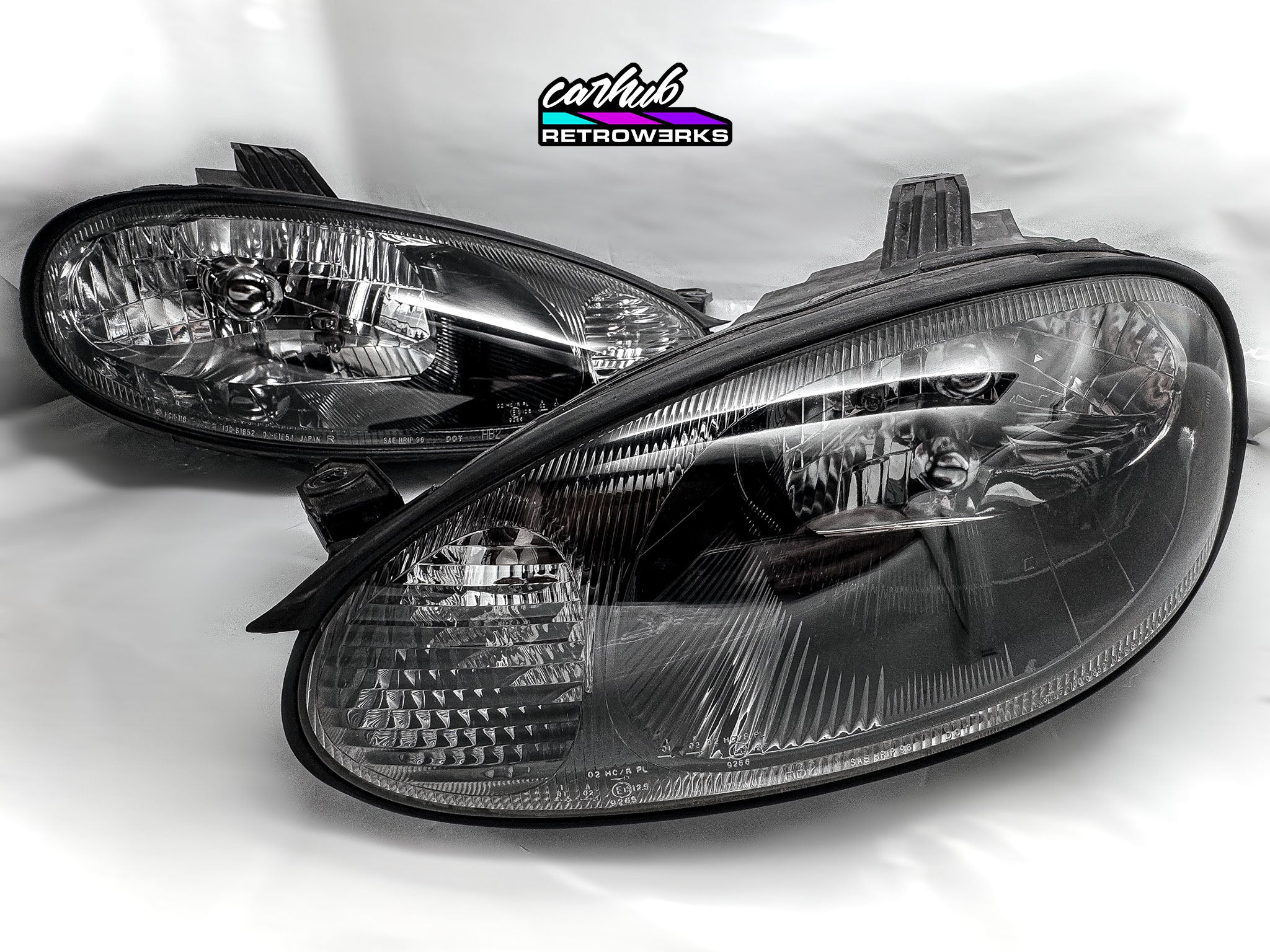 NB1 Mazda MX-5 Miata MK2 gloss black insert restored original headlights by carhub retrowerks