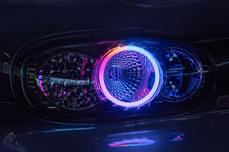 Customized Clear NB2 Mazda Miata Taillights with RGB Halos installed on a NB Miata close up