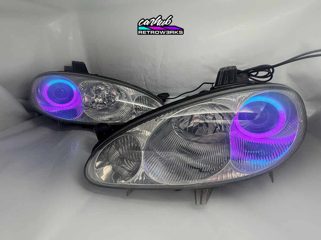 NB Mazda MX-5 Miata Clear headlights retrofitted with rgb halos showcase white background