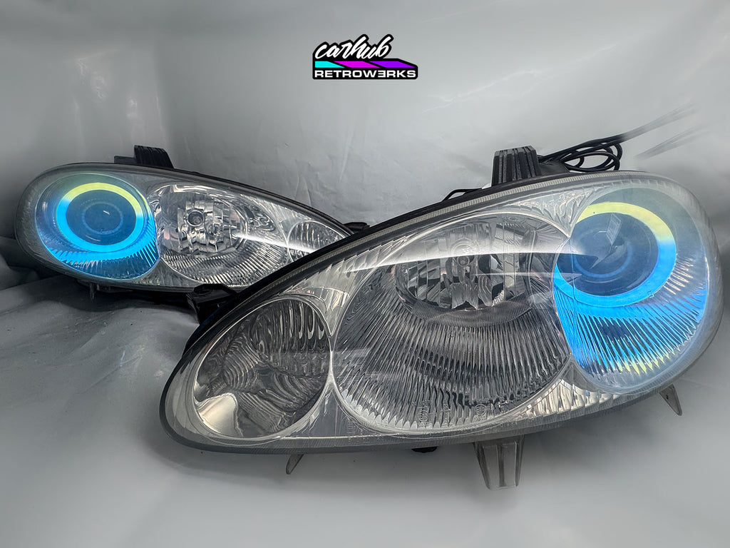 NB Mazda MX-5 Miata Clear headlights retrofitted with rgb halos showcase white background