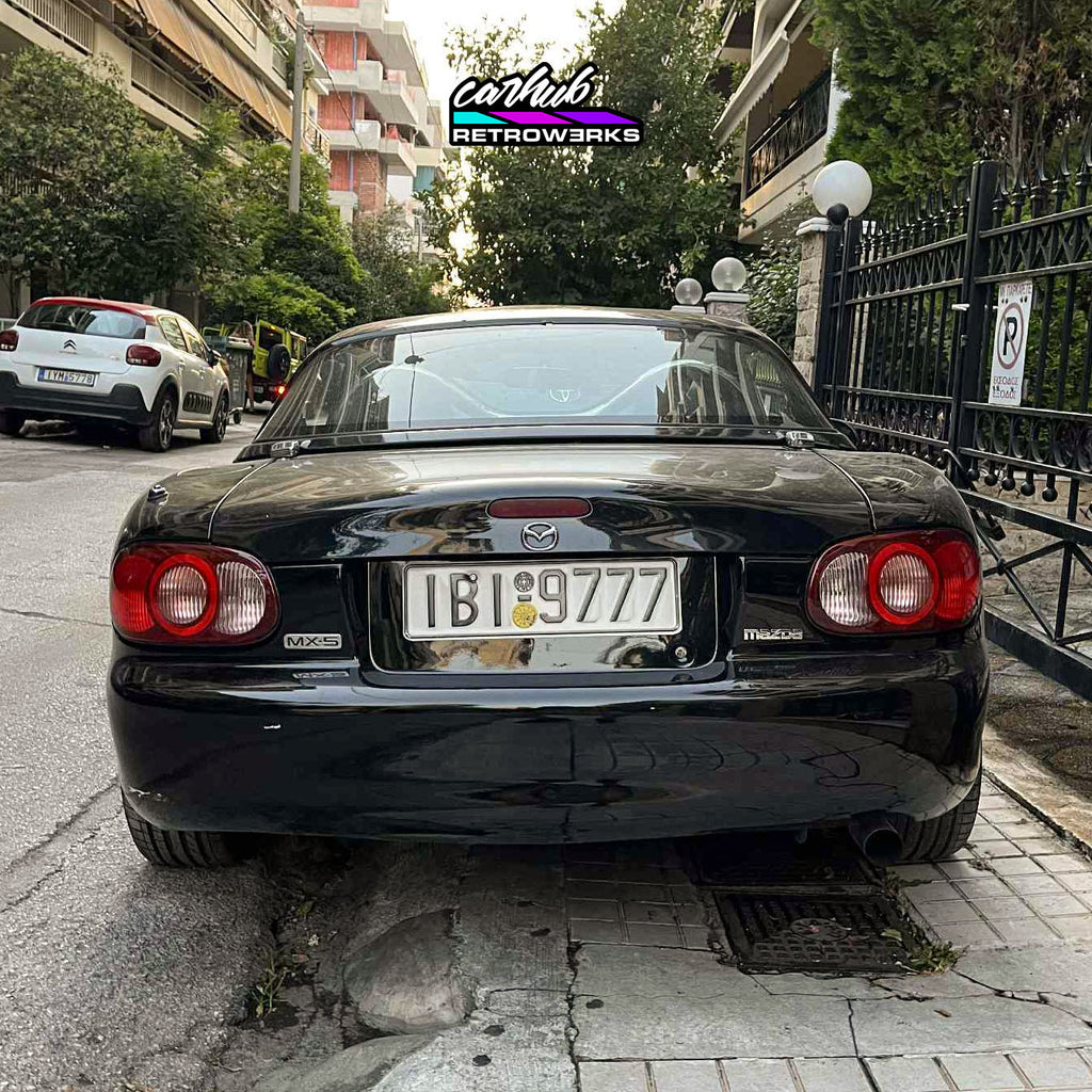 Pair of mazda mx5 nb nb2 halo taillights by carhub retrowerks installed on nb2 miata clear version no tint