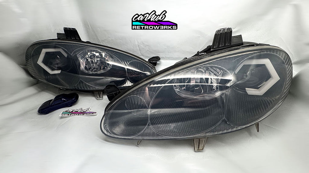 NB Mazda MX-5 Miata black headlights retrofitted with hexagon white halos