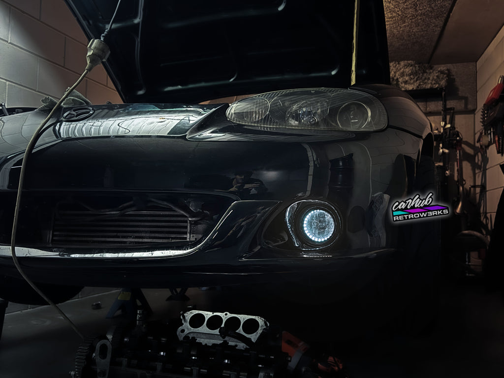 NB2 MK2.5 Mazda MX-5 Miata featuring Carhub retrowerks RGB halo retrofitted foglights white mode
