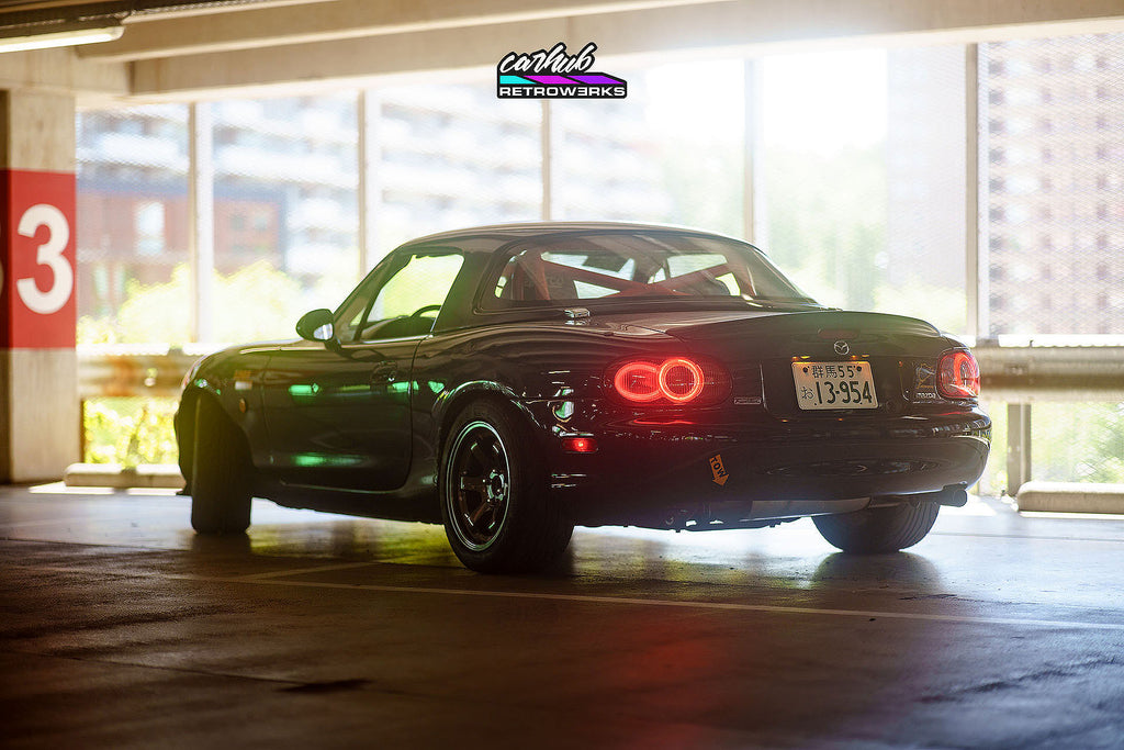 Customized OEM NB2 Mazda Miata Taillights with Halos and Strips installed on a NB