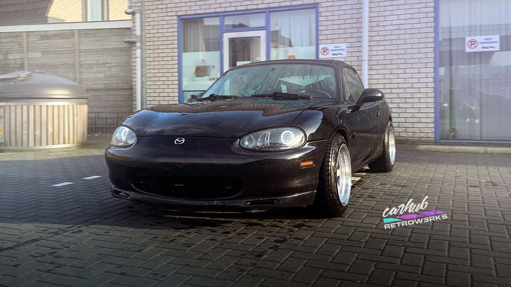 Set of 2.5 projector retrofitted headlights with white halos on nb1 nb mazda mx5 miata