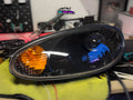 mazda mx5 nb nb1 miata mk2 with 3 inch projector retrofit gloss black interior and demon eyes